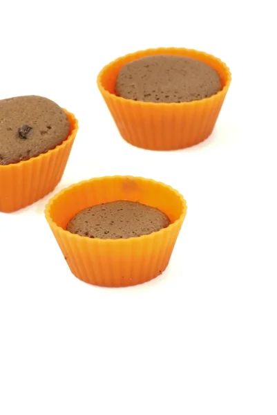 Chocolate muffins in silicone holders — Stock Photo, Image