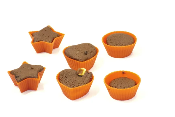 Choklad muffins i silikon hållare med form av hjärta och sta — Stockfoto