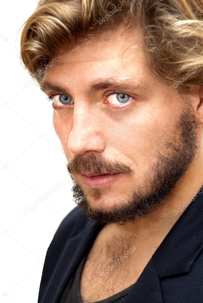 Schöner Mann mit Bart und blauen Augen - Stockfotografie Schöner Mann mit Bart und blauen Augen - Stockfotografie