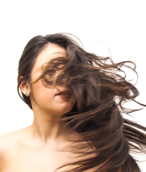 美しい女性が彼女の髪の揺れ — ストック写真
