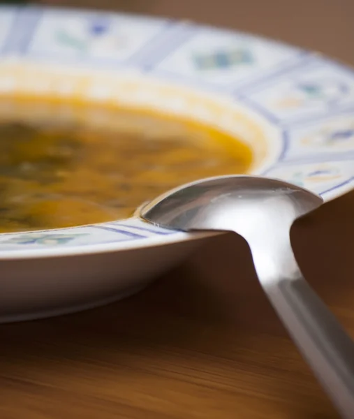 Soup bowl with spoon — Stock Photo, Image