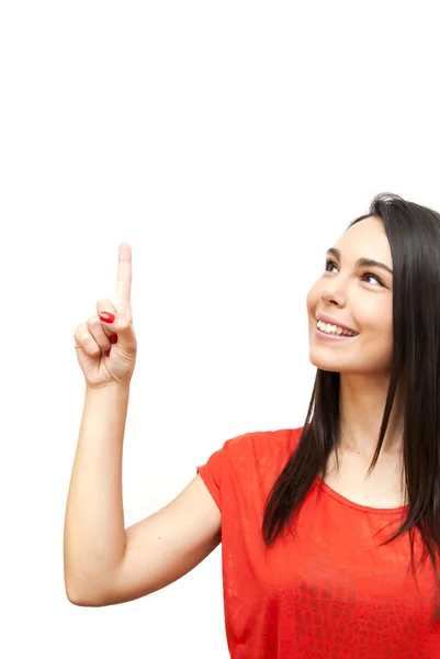 Mooie vrouw die haar vinger omhoog wijst — Stockfoto