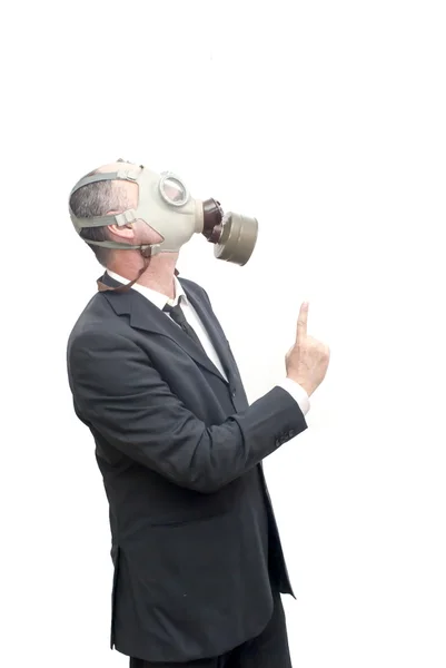 彼の人差し指を上向き防毒マスクを持ったビジネスマン — ストック写真