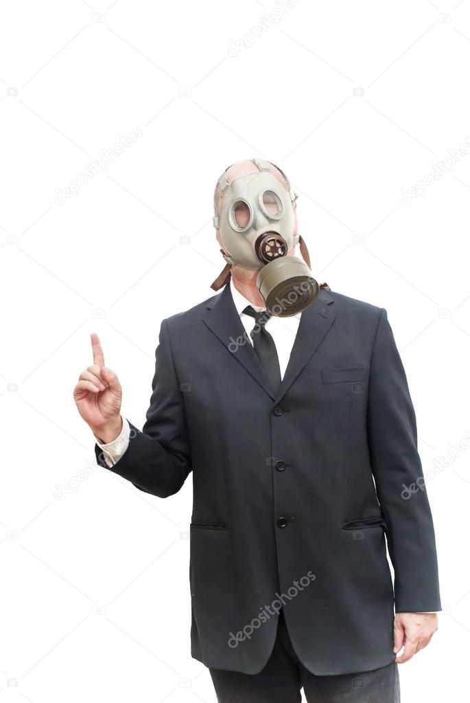 Businessman with gas mask pointing his index finger up