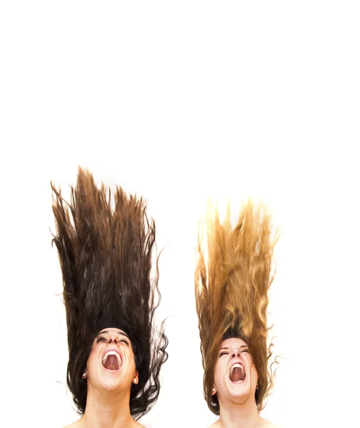 Portrait of two beautiful women who were moving her hair — Stock Photo, Image