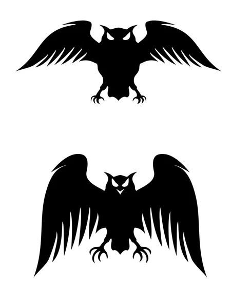 Літаючі сови. Стилізовані силуети логотипів. Вектор eps8 ізольовано на — стоковий вектор