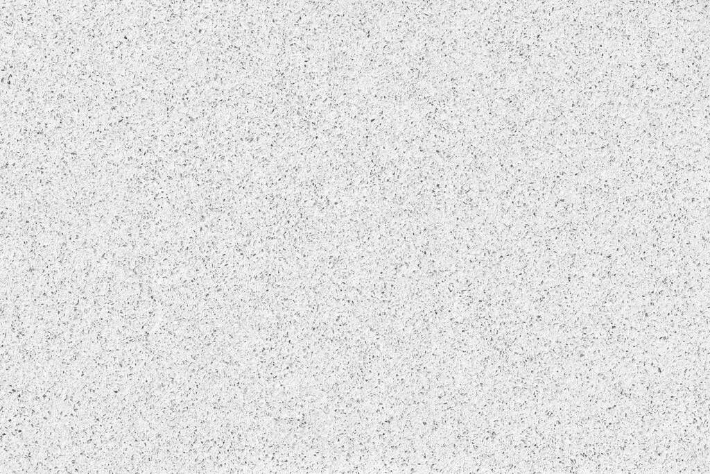 Quartz surface white for bathroom or kitchen countertop. High resolution texture and pattern.