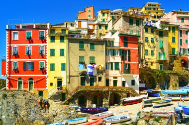 Riomaggiore village street, boats and houses. Cinque Terre, Ligu clipart