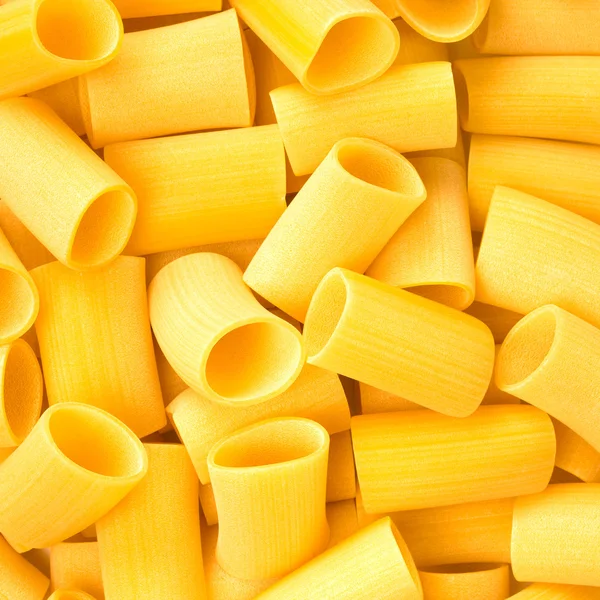 Italien Paccheri Macaroni Pâtes alimentaires crues fond ou texture — Photo