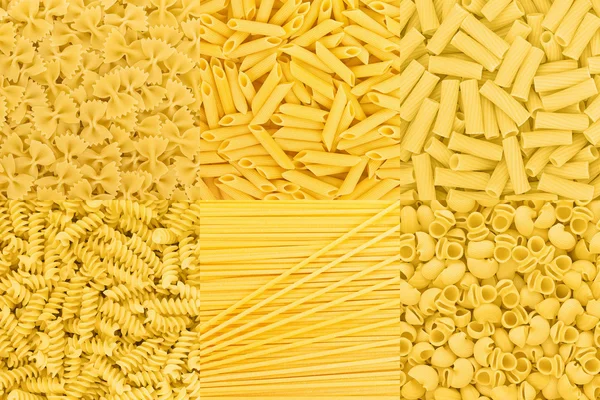 Pasta italiana de la colección de alimentos crudos textura de fondo. Espaguetis —  Fotos de Stock