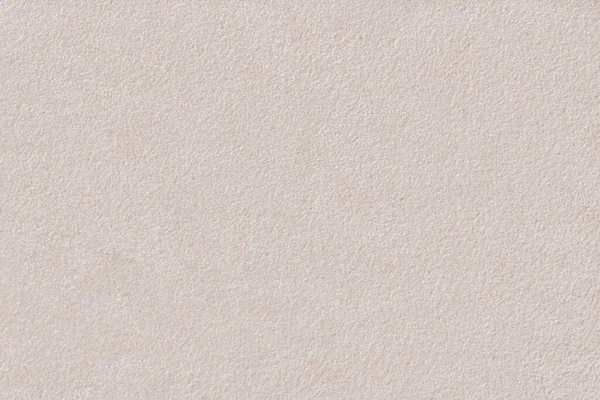 Yüksek kalite dikişsiz kireç taşı ya da bej taştan bir duvarın arka planı. Tasarım ve metin kaplaması için mükemmel nötr fotoğraf arkaplanı.