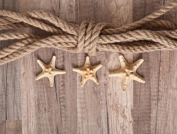 Fondo de viaje, estrellas de mar y cuerda de barco — Foto de Stock