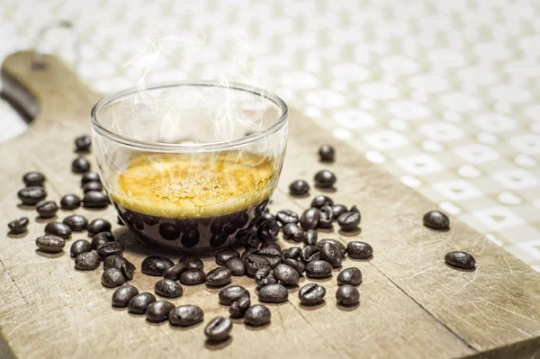 Cup of coffee with coffee grains — Stock Photo, Image