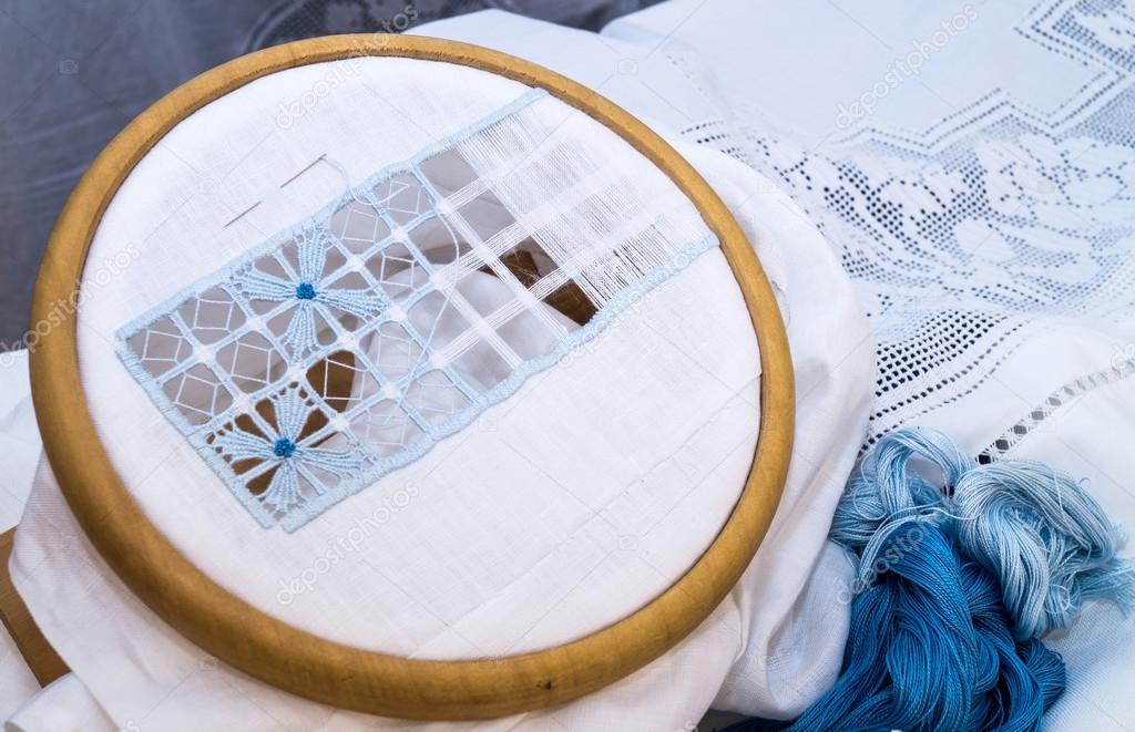 The embroidery hoop with canvas and sewing 