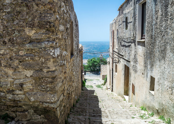 Ancient cobblestone street in Erice, Sicily, Italy