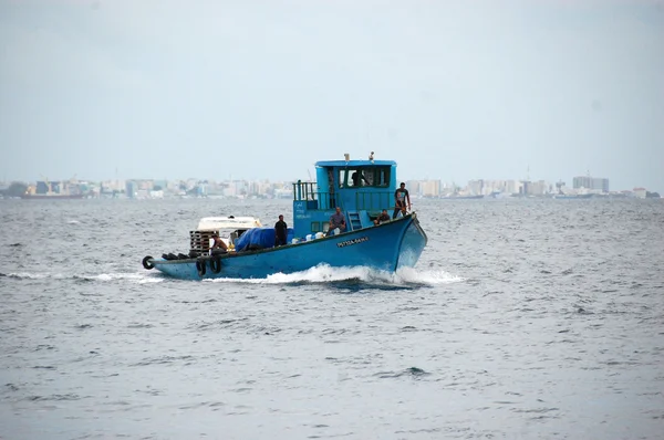 Blue ship at ocean — Stock Photo, Image