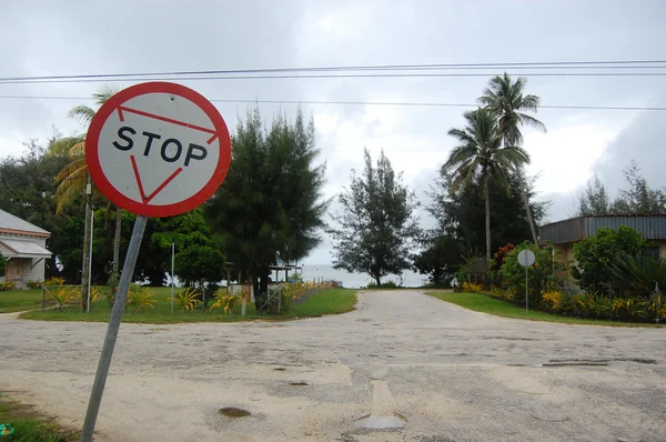 Stop sign at road junction Tonga — Stock Photo, Image