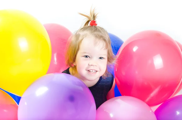 Baby girl and ballons — Stock Photo, Image