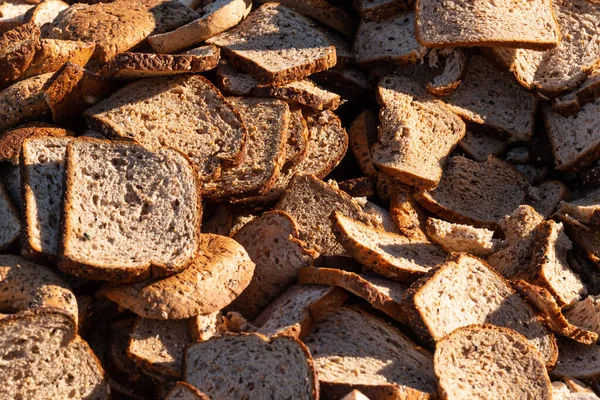 Rotting bread food scraps for organic soil or animal food.