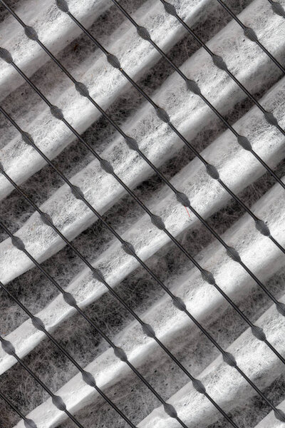 Close up pattern of a clean air furnace or air conditioning filter.