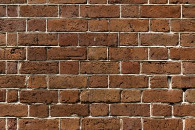 Beyaz çimento desenli eski kırmızı-kahverengi tuğla duvar.