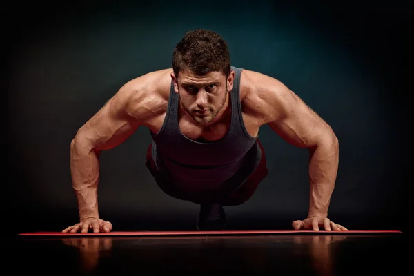 Athletic young man portrait in studio — Stock Photo, Image