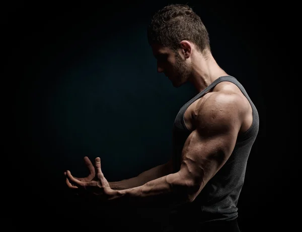 Athletic young man portrait in studio — Stock Photo, Image