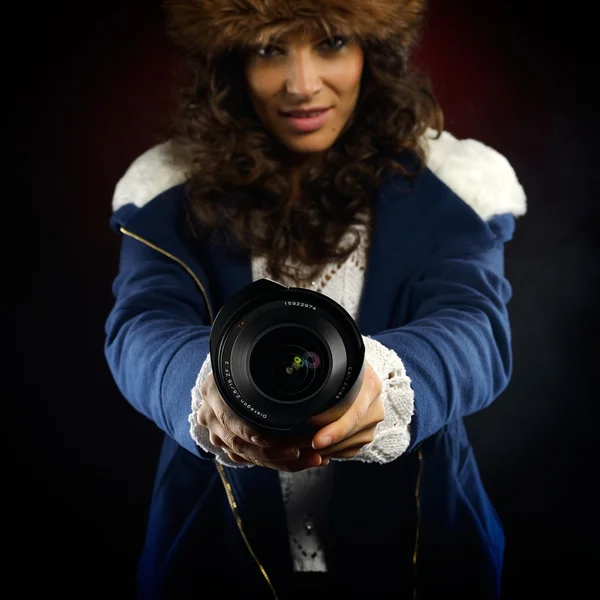 Young pretty woman holding photo lens — Stock Photo, Image