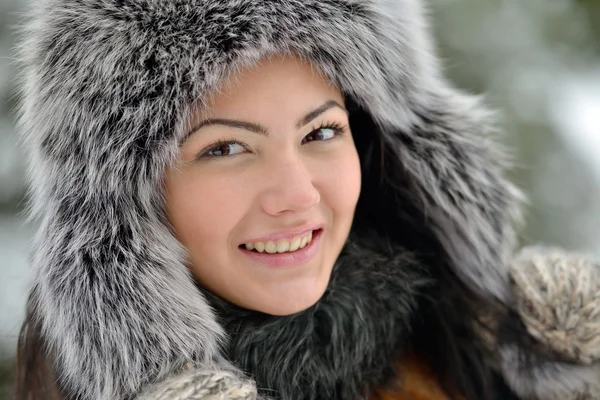 Beautiful female in luxurious fur head cloth outdoor in winter — Stock Photo, Image