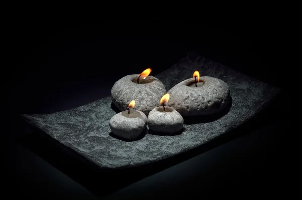 Burning candles isolated on black — Stock Photo, Image
