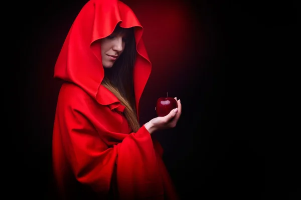 Beautiful woman with red cloak — Stock Photo, Image