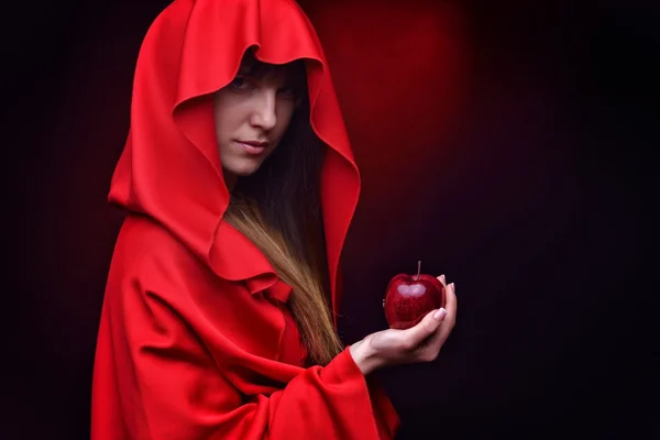 Beautiful woman with red cloak — Stock Photo, Image