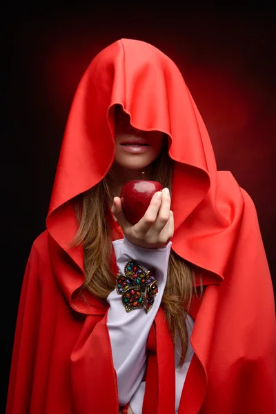 Beautiful woman with red cloak — Stock Photo, Image