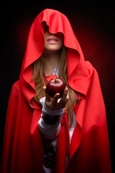Beautiful woman with red cloak — Stock Photo, Image