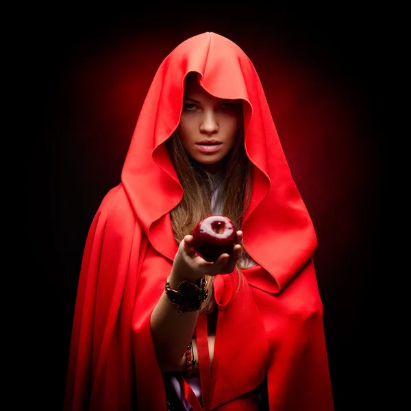 Beautiful woman with red cloak — Stock Photo, Image