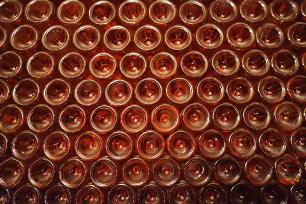 Stacked up wine bottles in the cellar, dusty but tasty — Stock Photo, Image