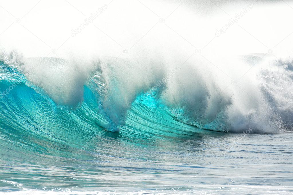 big wave breaking and surfer