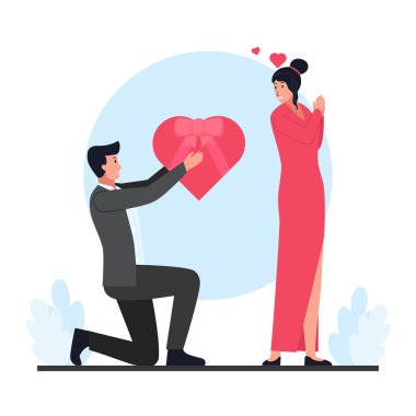 Erkek, sevgililer gününde bir kadına hediye kutusu veriyor..