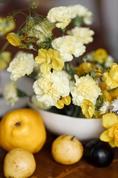 stock image Wedding decor in trendy shades, composition on the table with printing. A delicate composition with yellow flowers and fruits, with wedding invitations.