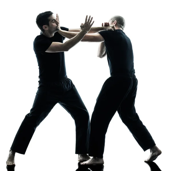 Men krav maga fighters fighting isolated — Stock Photo, Image