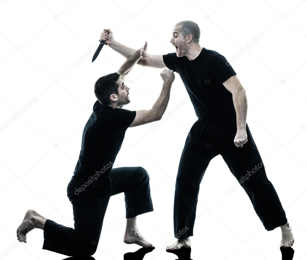 Men krav maga fighters fighting isolated — Stock Photo © STYLEPICS