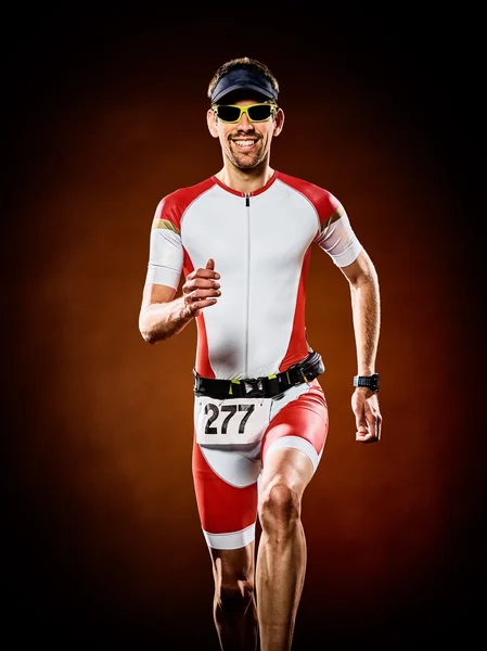 Uomo corridore corsa triathlon ironman isolato — Foto Stock