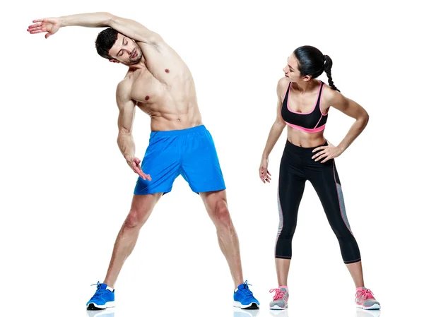 Пара мужчин и женщин фитнес упражнения изолированы — стоковое фото