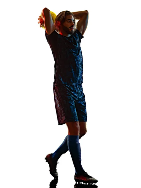Ung fotbollsspelare isolerad vit bakgrund siluett skugga — Stockfoto