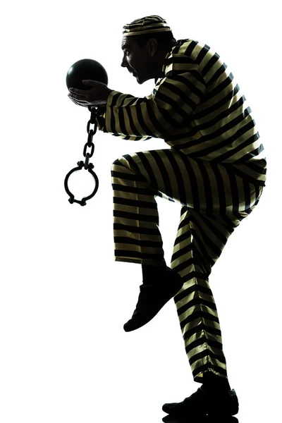 Adam mahkum suçluyla zinciri top siluet — Stok fotoğraf