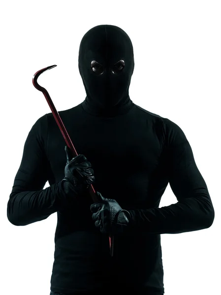 Thief criminal holding crowbar portrait silhouette — Stock Photo, Image