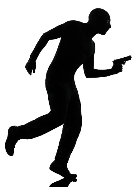 Thief criminal terrorist silhouette — Stock Photo, Image