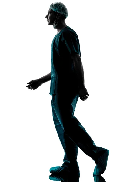 Doctor surgeon man walking silhouette — Stock Photo, Image