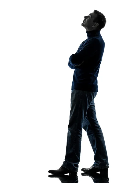 Man looking up pensive silhouette full length — Stock Photo, Image