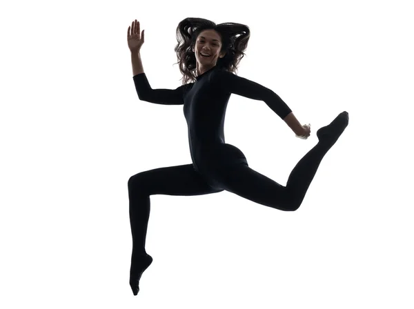 Wykonując działa sylwetka skoki kobieta — Zdjęcie stockowe